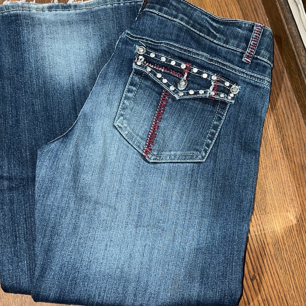 Cowgirl Tuff Co. studded boot cut jeans sz 28/35